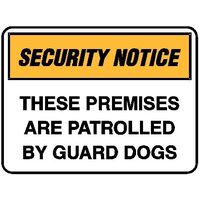 Security Notice - These Premises Are Patrolled By Guard Dogs
