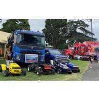 Signs for Fulton Hogans Ride On Lawn Mower Race in Maitland