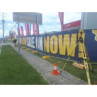How do you install printed banner mesh to a temporary fence